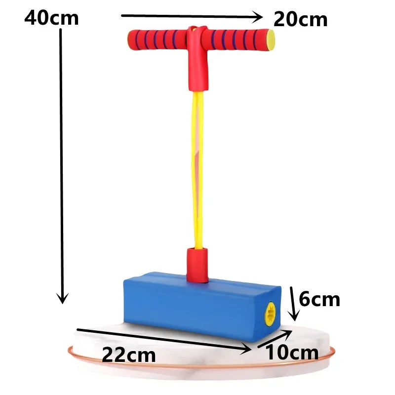 Child improving balance and coordination with jumping fitness toy.