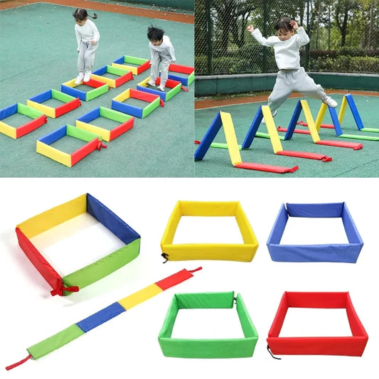 Children jumping through colorful sensory hoops outdoors