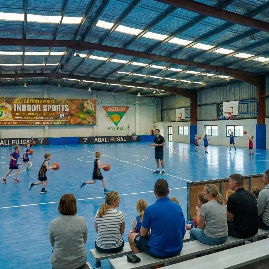 A smiling 5-year-old child happily participating in the Grow and Go program with a coach at First Pick Academy Box Hill South.