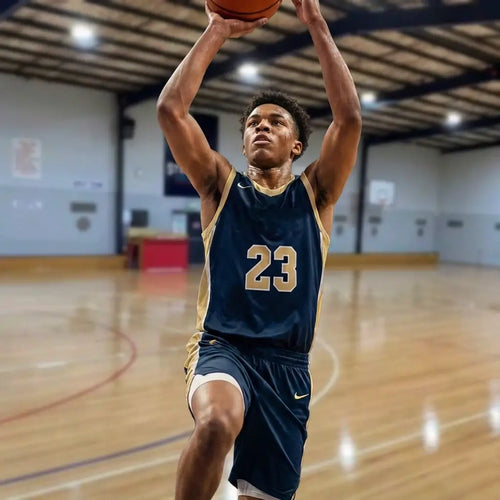 An intense, close-up shot of a focused youth basketball player performing a low dribble at a First Pick EDP assessment session in Wheelers Hill. The image highlights the player's concentration and elite skill level.