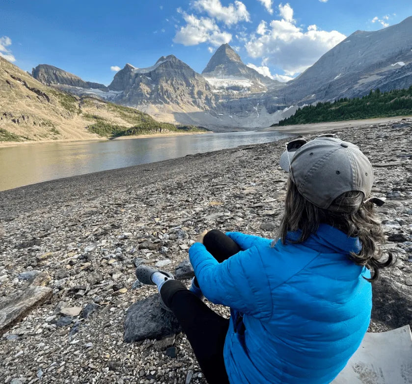 Emma, a Manningham parent, observing a high-intensity 5+3 drill with focus and pride at the Manningham DISC stadium, reflecting the premium athletic community in Melbourne