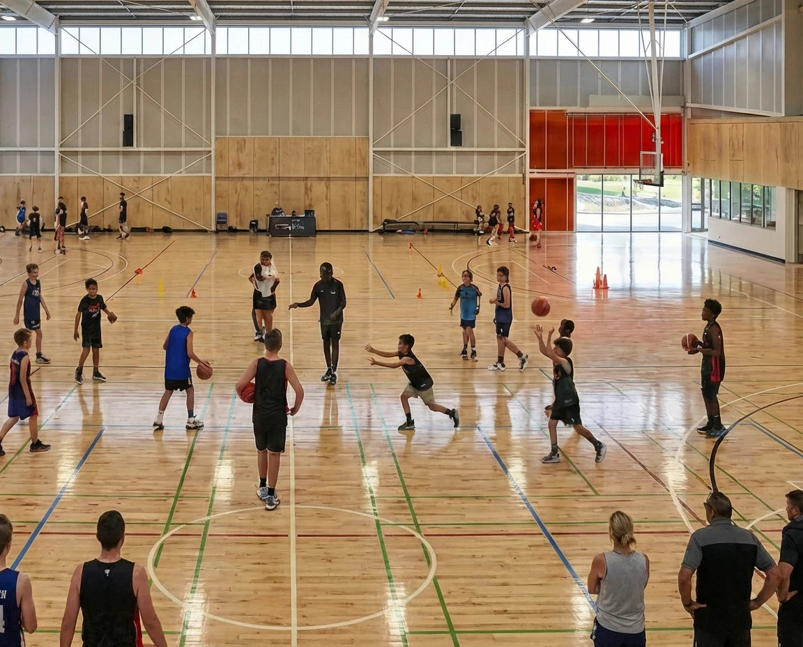 A focused junior athlete practicing high-intensity dribbling at the First Pick x Redroo Elite Academy in Wheelers Hill.