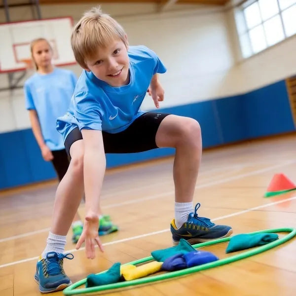 A 6-year-old practicing footy skills, focusing on coordination and social confidence through teamwork.