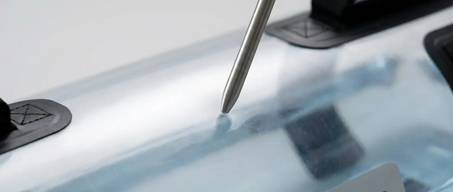 Durability test showing scratch-resistant PVC material of fitness water bag