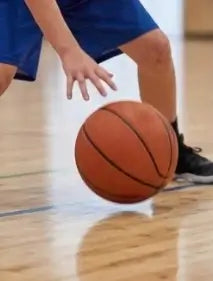 A stylish 13-year-old basketball player with a headband, representing the modern competitive spirit of First Pick Academy.